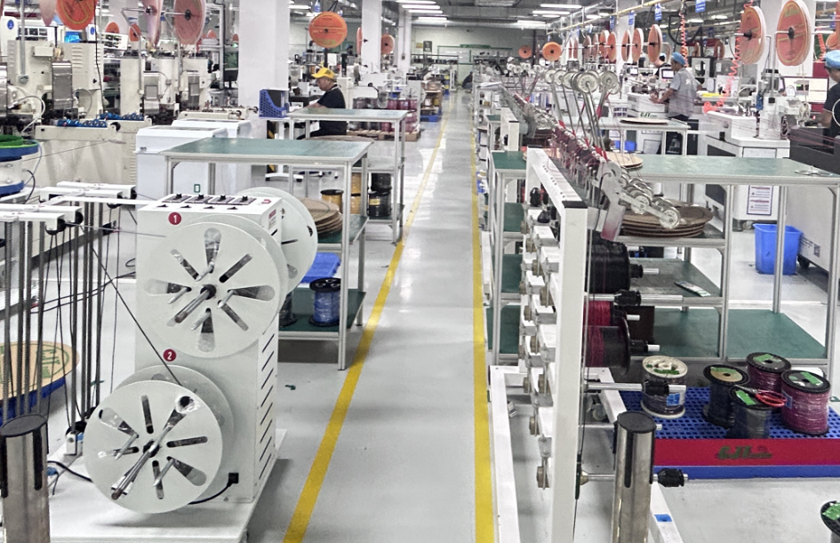 MOQ and Lead Time for Custom Wire Harness Manufacturing High-speed automated stripping and crimping machinery at WireAssyTech workshop